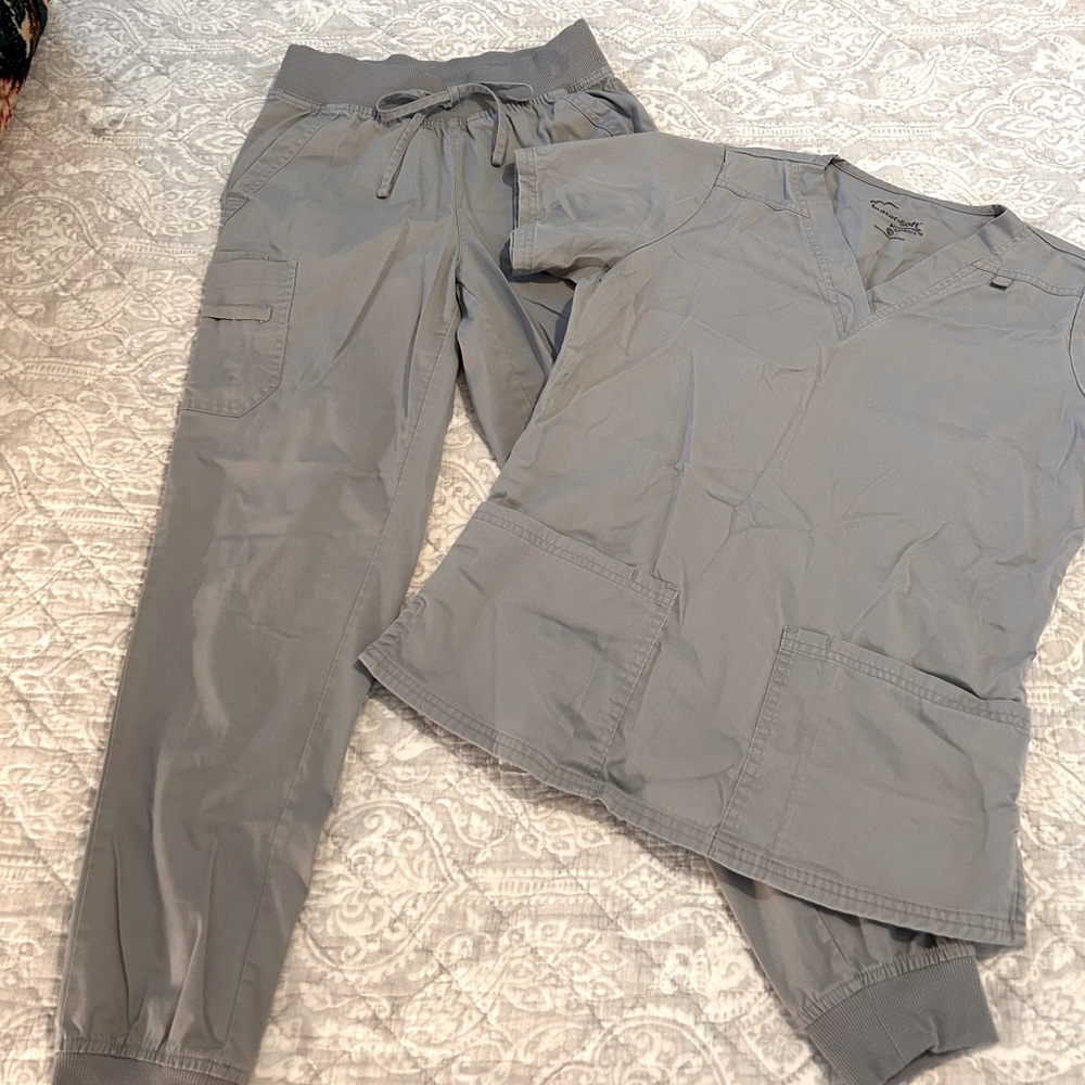 Women’s grey UA Buttersoft scrub set. Top size: XS. Bottom Joggers size: XS.